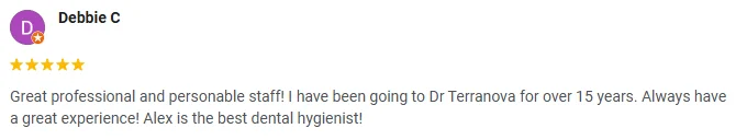 A 5-star Google review of Elite Dental Associates praising the professional staff