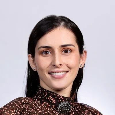 A headshot photo of Dr. Manreet Kaur, a dentist at Elite Dental Associates